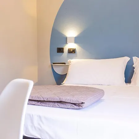 & Aparthotel