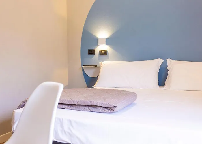 & Aparthotel