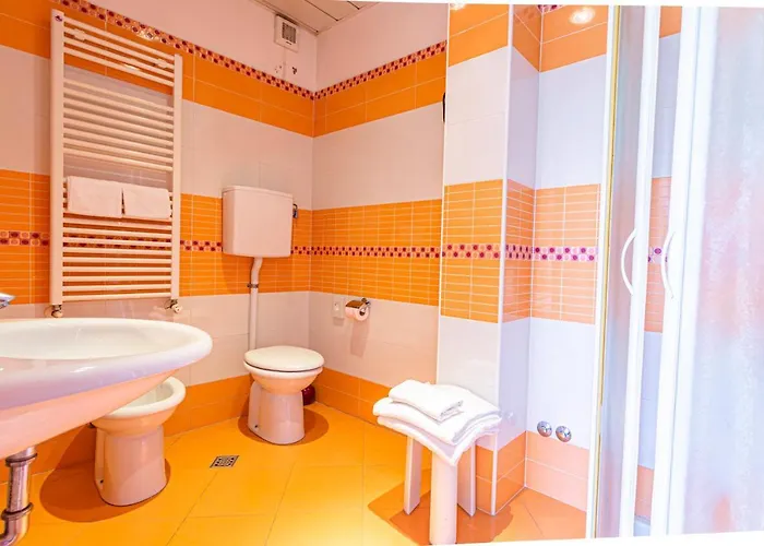 & Aparthotel