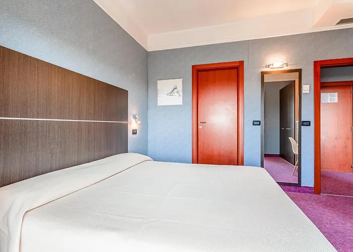 & Aparthotel