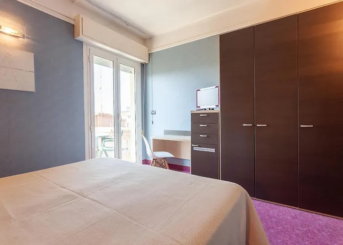& Aparthotel
