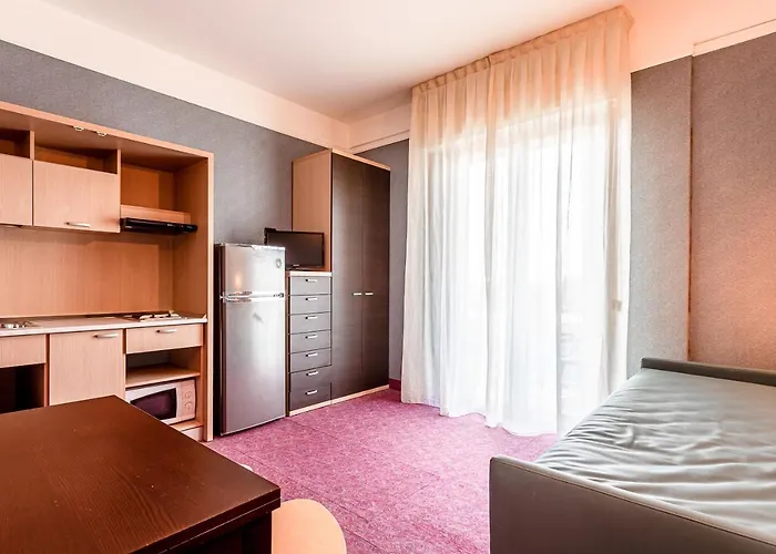 & Aparthotel